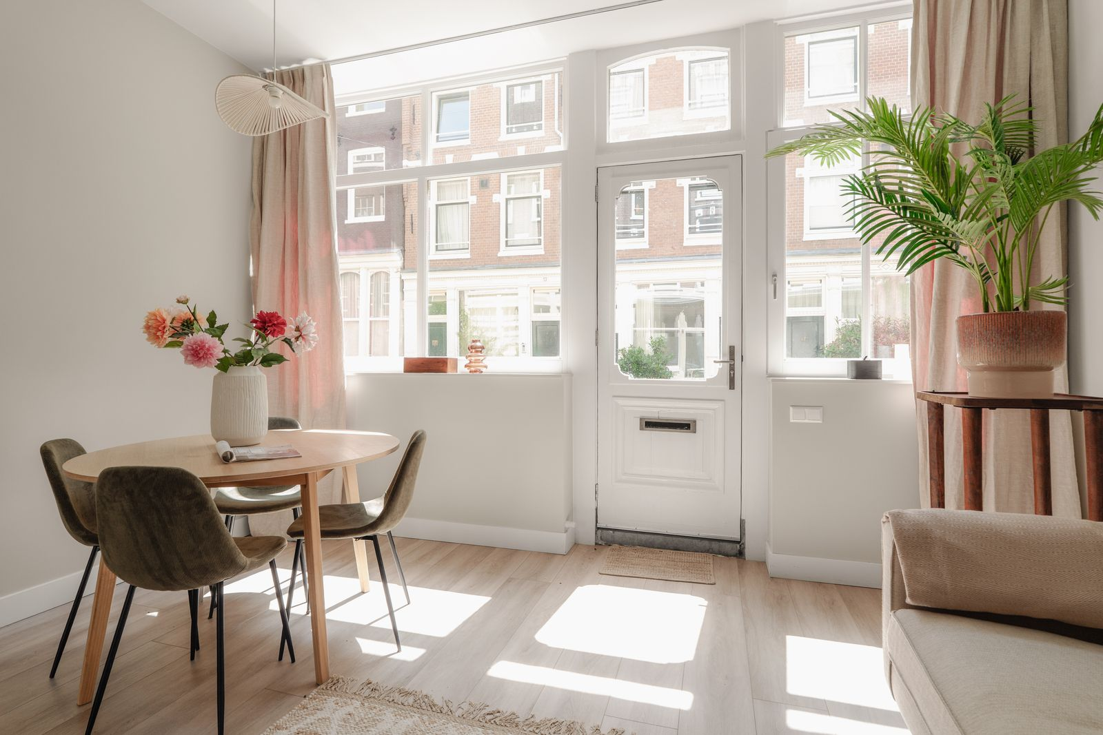 Framedworks — Dining detail with floral arrangement